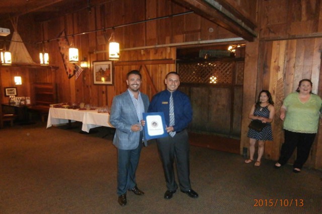 Manager of Cattlemens receiving certificate of recognition #2